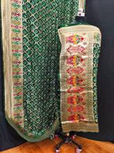 Flattering Bandhej Green Color Silk Saree